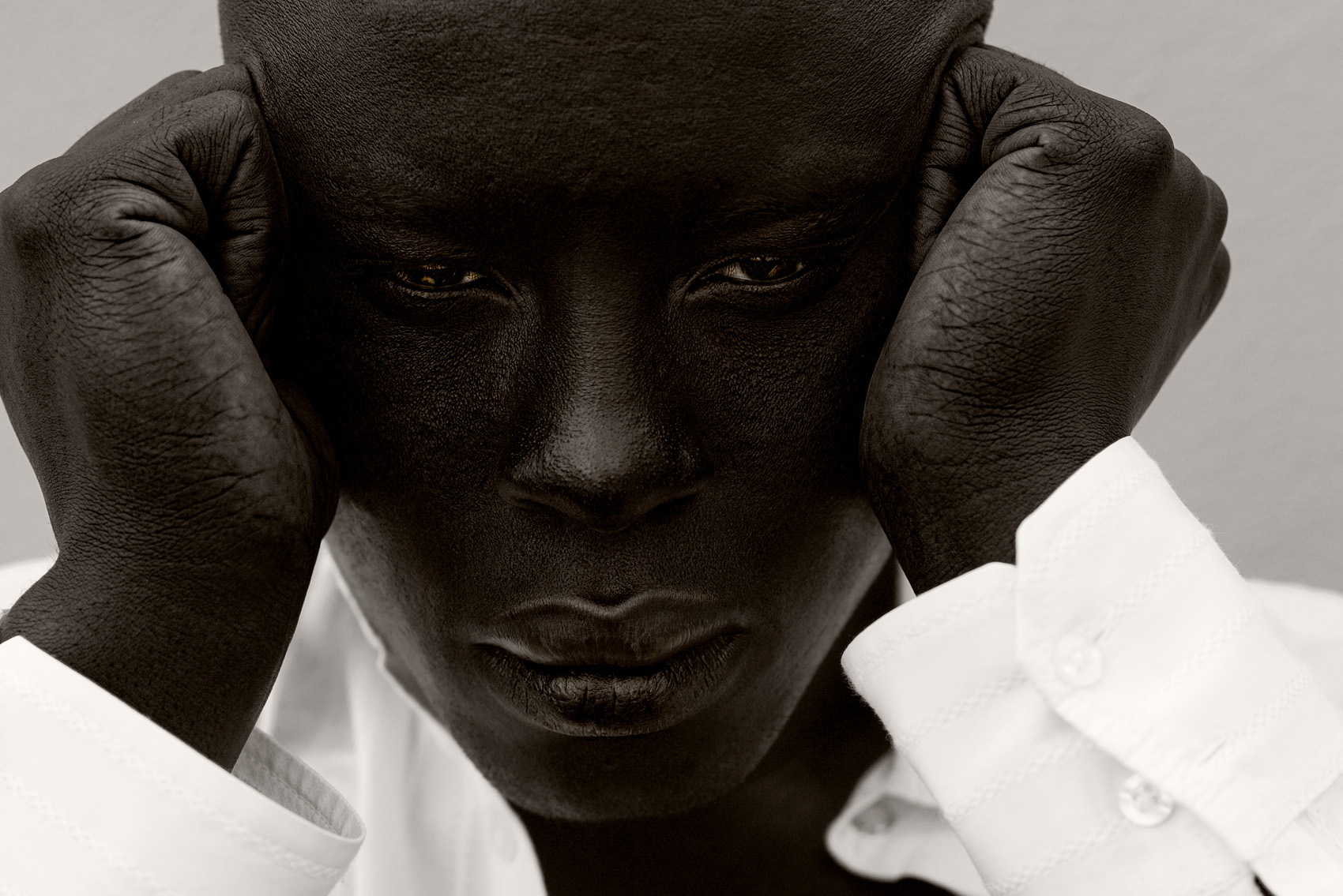 Modu Seye, black and white closeup portrait.