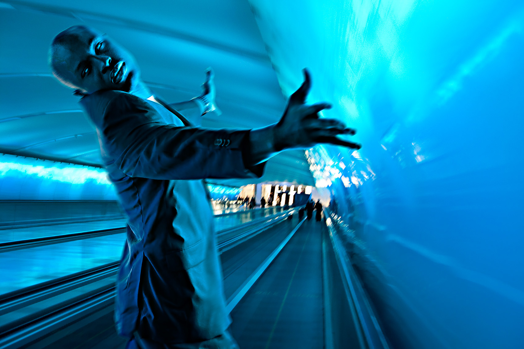 Modu Seye in Detroit airport tunnel.  by Scott Dobry Pictures photographer in Omaha, Nebraska
